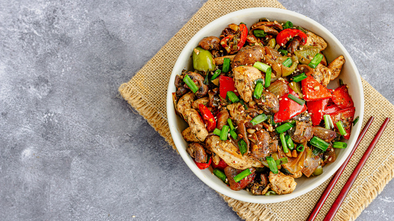 stir-fry made with vegetables and chicken pieces