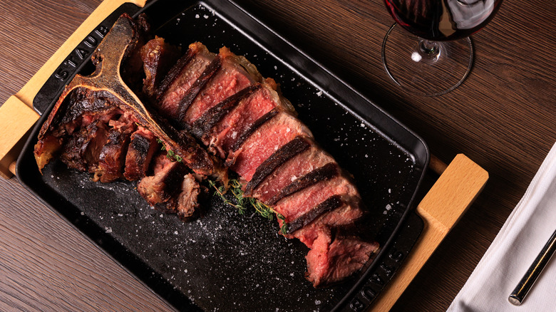 Sliced steak on a pan