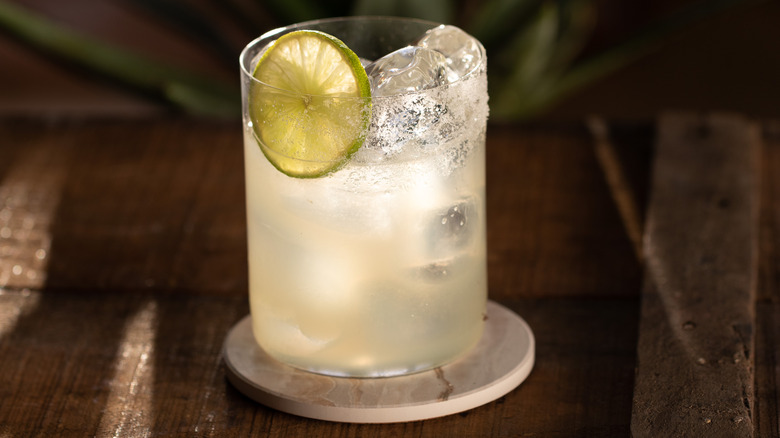 tequila with lime on the rocks