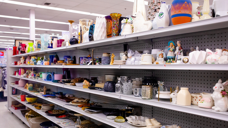 Shelves full of kitchenware in a thrift store