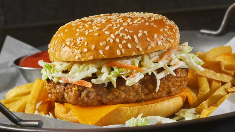 Cheeseburger with coleslaw topping