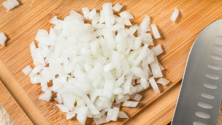 Organic Chopped Diced Onions on a Cutting Board