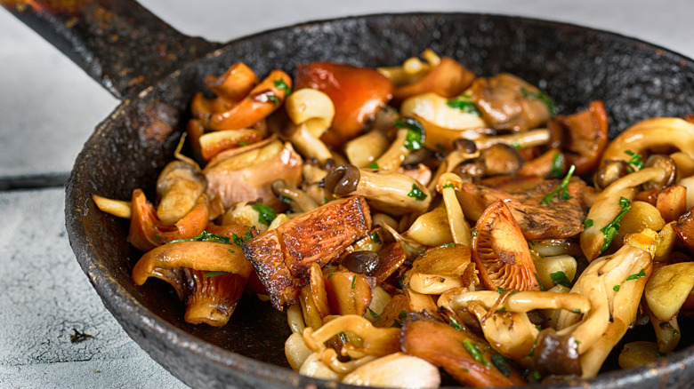 sautéed mushrooms in a cast-iron pan