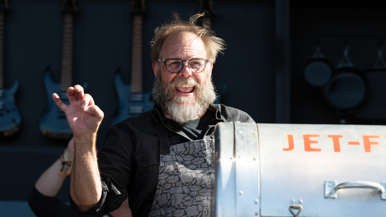 Alton Brown smiling and expressing himself