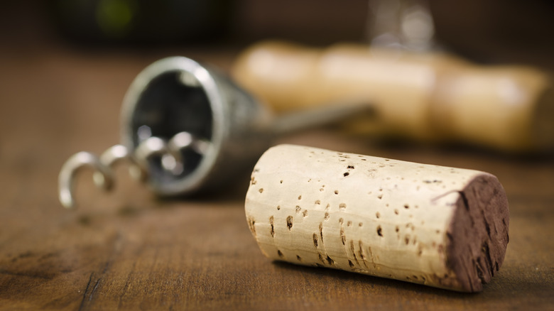 Wine cork and corkscrew.