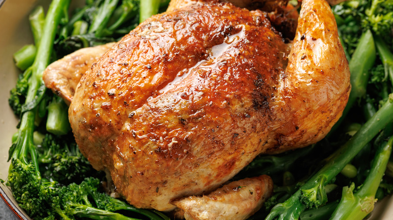 rotisserie chicken on a bed of leafy greens