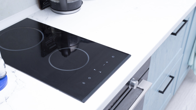 double burner induction stove on a white counter