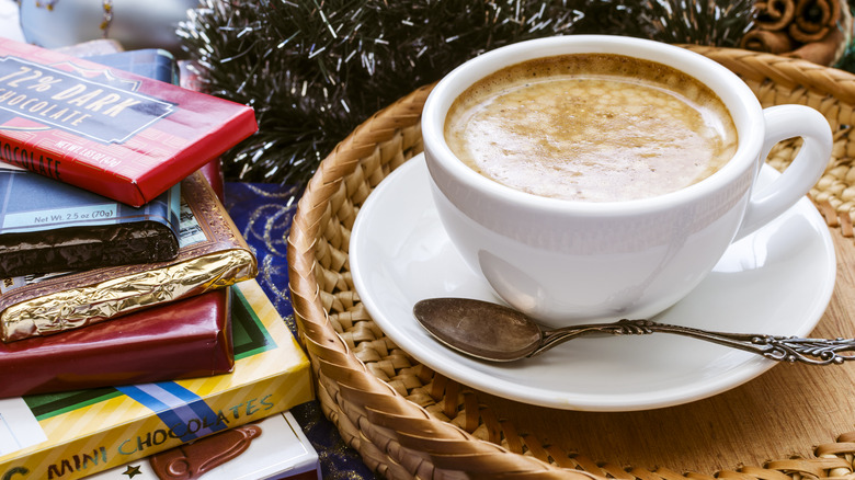 Cup of coffee with chocolate bars