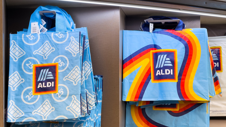 colorful reusable shopping bags with Aldi's logo