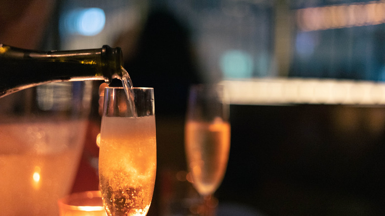 Pouring Champagne into a glass