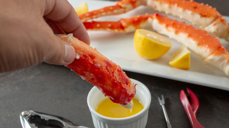 person eating crab legs