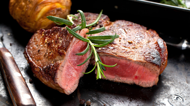 close up of a steak cut in half