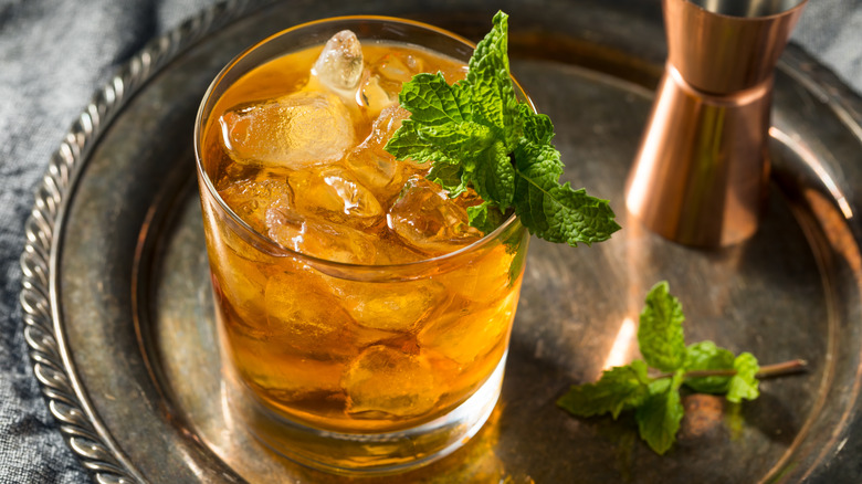 Stinger cocktail with mint garnish