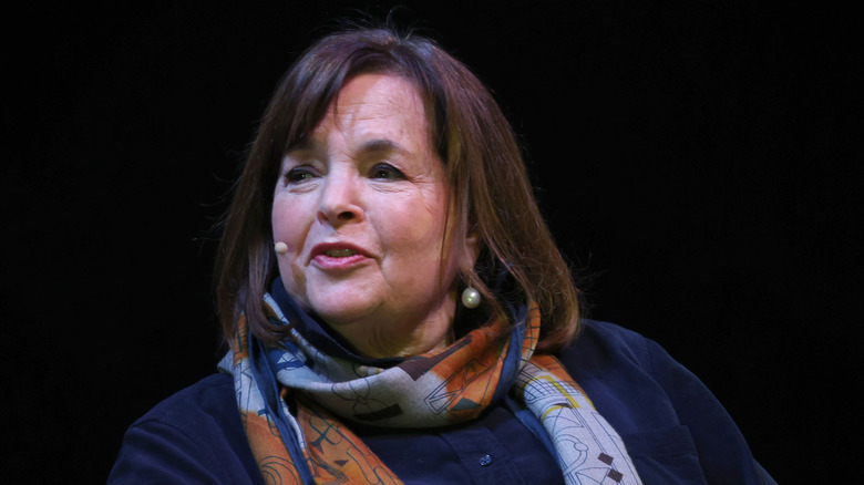 Celebrity chef Ina Garten sits on stage at an event.