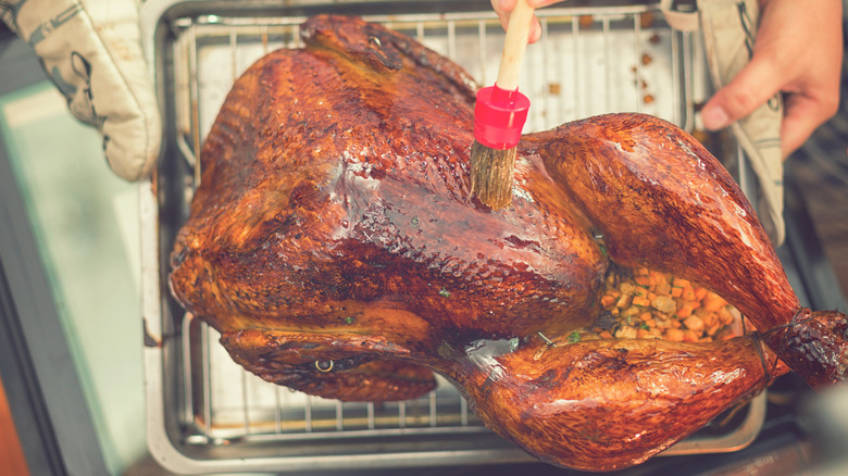 Overhead view of basted turkey