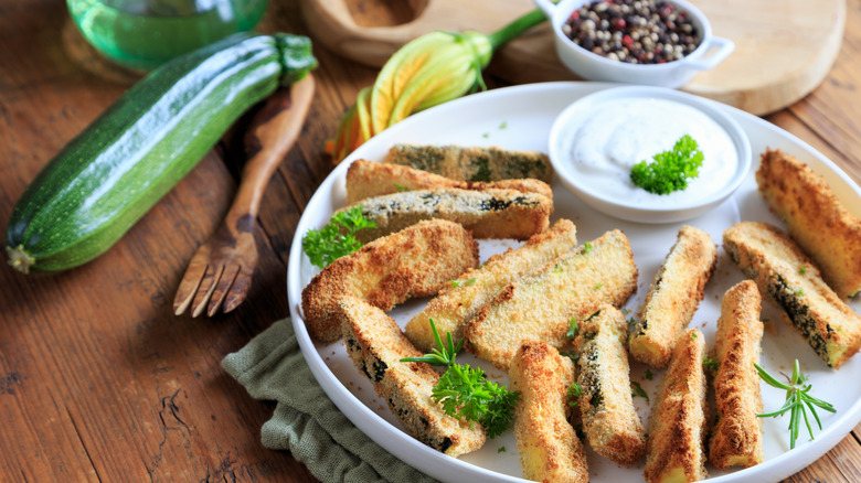 air fryer zucchini fries on a table