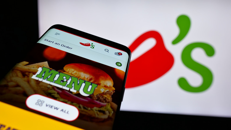 Mobile phone with Chili's logo and menu