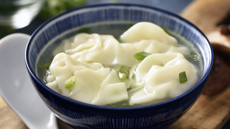 closeup of a bowl of wonton soup