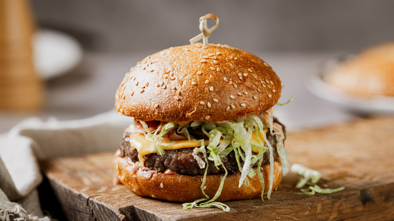 gourmet burger with lots of toppings