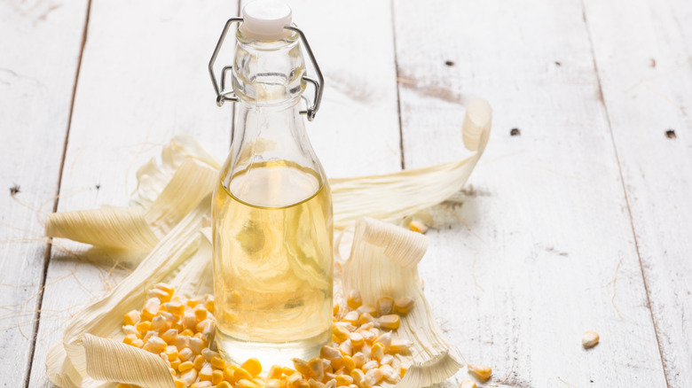 high fructose corn syrup and corn kernels