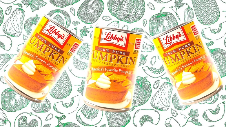 Three cans of Libby's pumpkin puree over a white background covered in green intricate drawings of whole and cut varieties of squash.