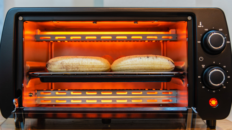 Bananas cooking inside a hot toaster oven