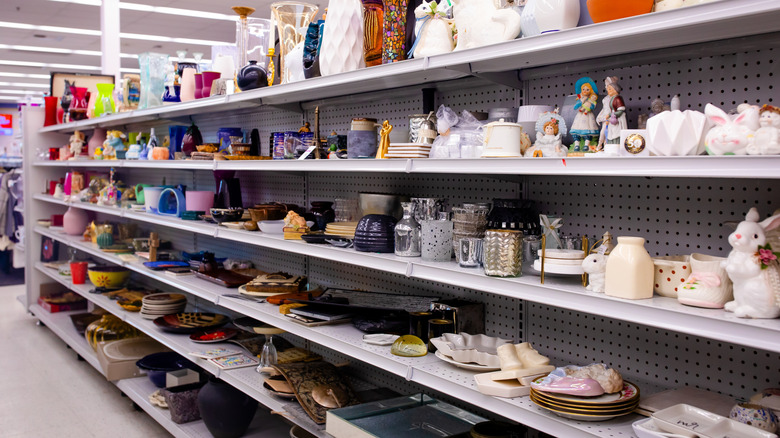 Thrift store shelves filled with ceramic items