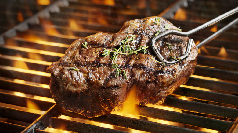 The Time Consuming Step You Can Ignore When Grilling Steak