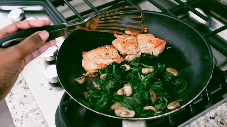 chef preparing salmon
