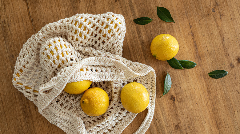 Lemons in a woven bag