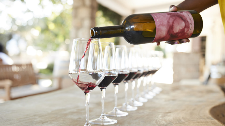 Wine tasting flight of red wines in outdoor patio