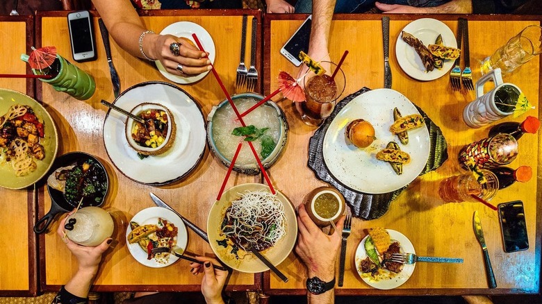 top down view of table with food at Tonga Room & Hurricane Bar