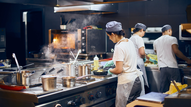 Chefs in commercial kitchen