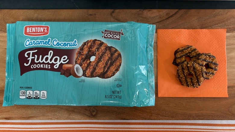 Benton's Caramel Coconut Fudge Cookies package next to three cookies on orange napkin