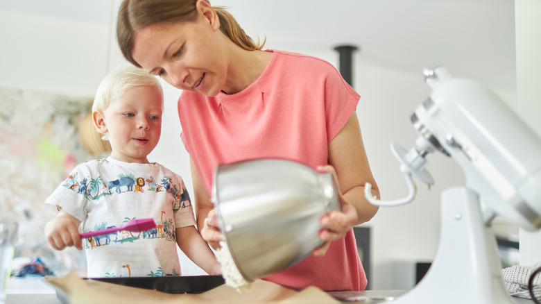 Woman and child with bowl