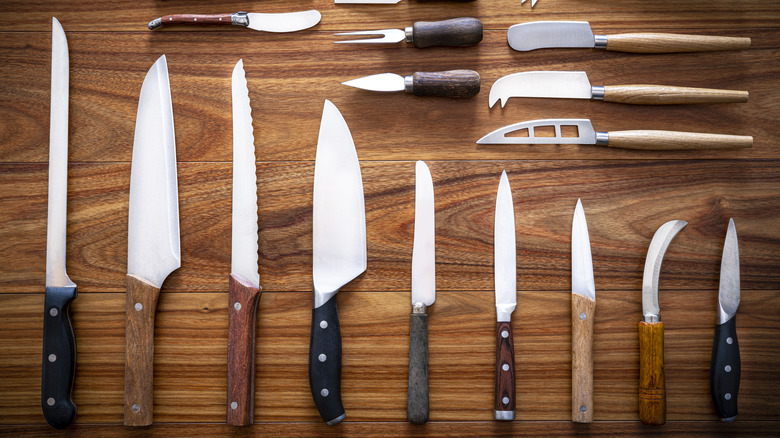 knives on wooden countertop