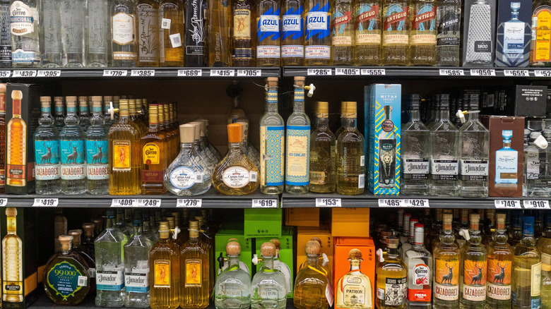 Bottles of mezcal and tequila at a store