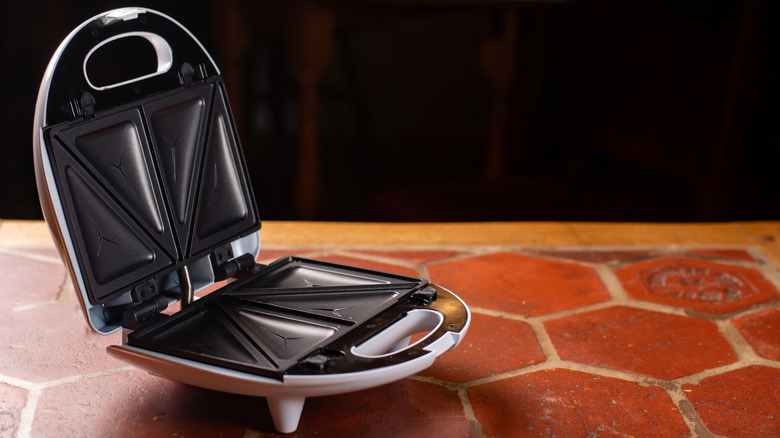 Empty open sandwich press in the kitchen