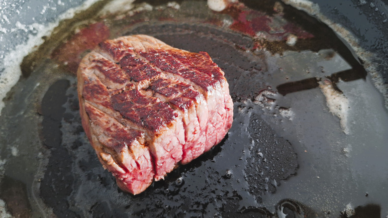 Steak with deep sear in pan
