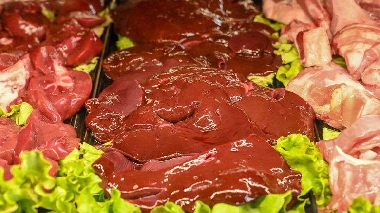 Fresh veal liver in a butcher shop.