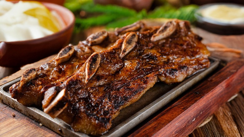 Cooked short rib steaks on a plate