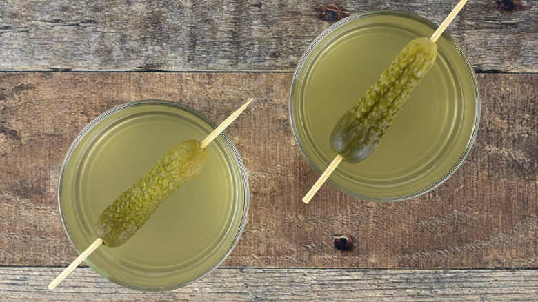 Two glasses of pickle juice