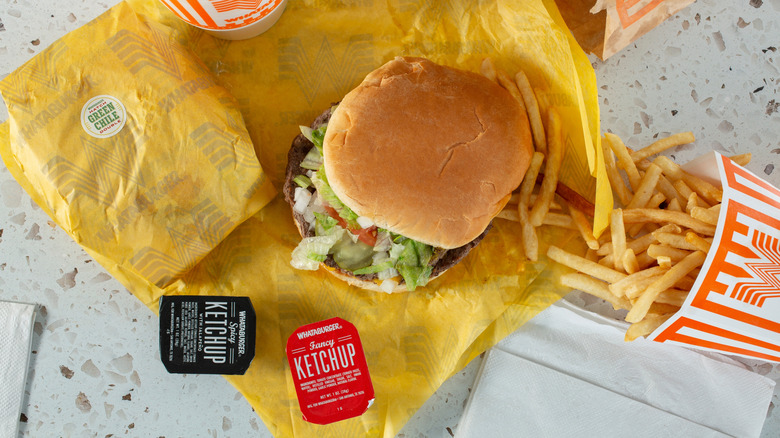 Top-down view of Whataburger burger and fries