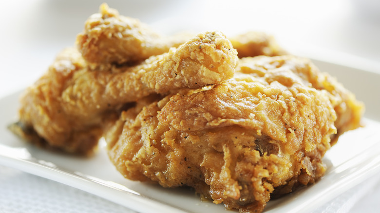Fried chicken on plate.