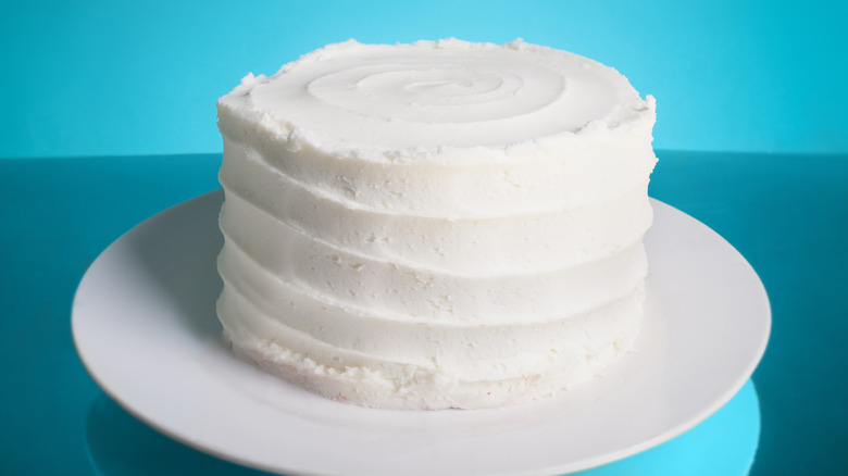 cake with white buttercream frosting