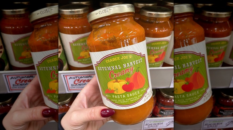 flavorful pasta dipping sauce in a beige ceramic bowl