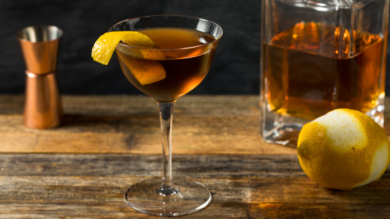 A Bobby Burns cocktail on a wooden bar