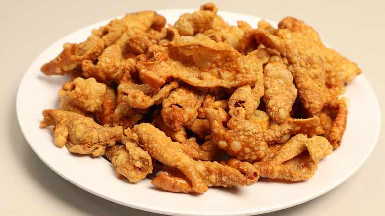 A plate of fried chicken skins