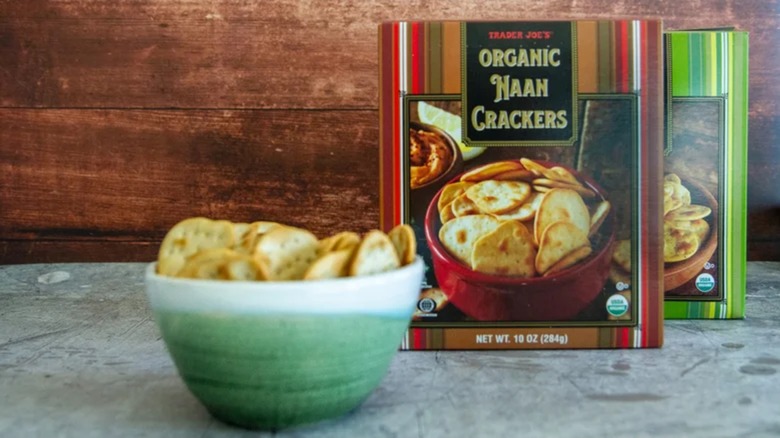 a box of Trader Joe's organic naan crackers with a bowl