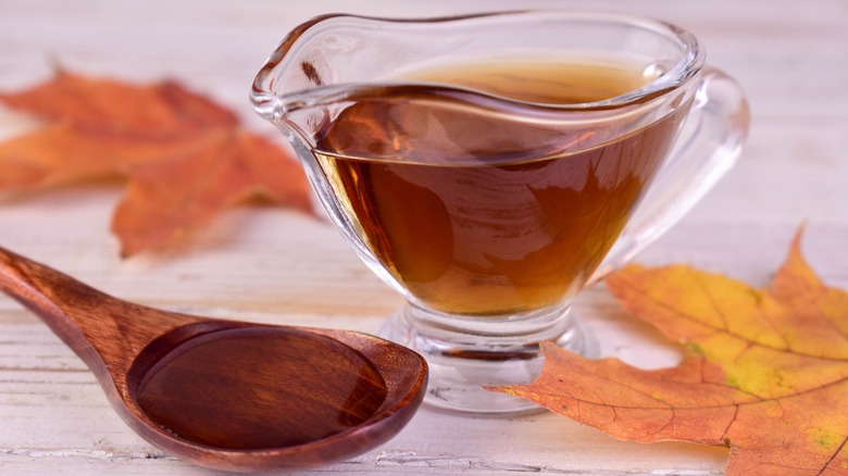 A small pitcher with maple syrup